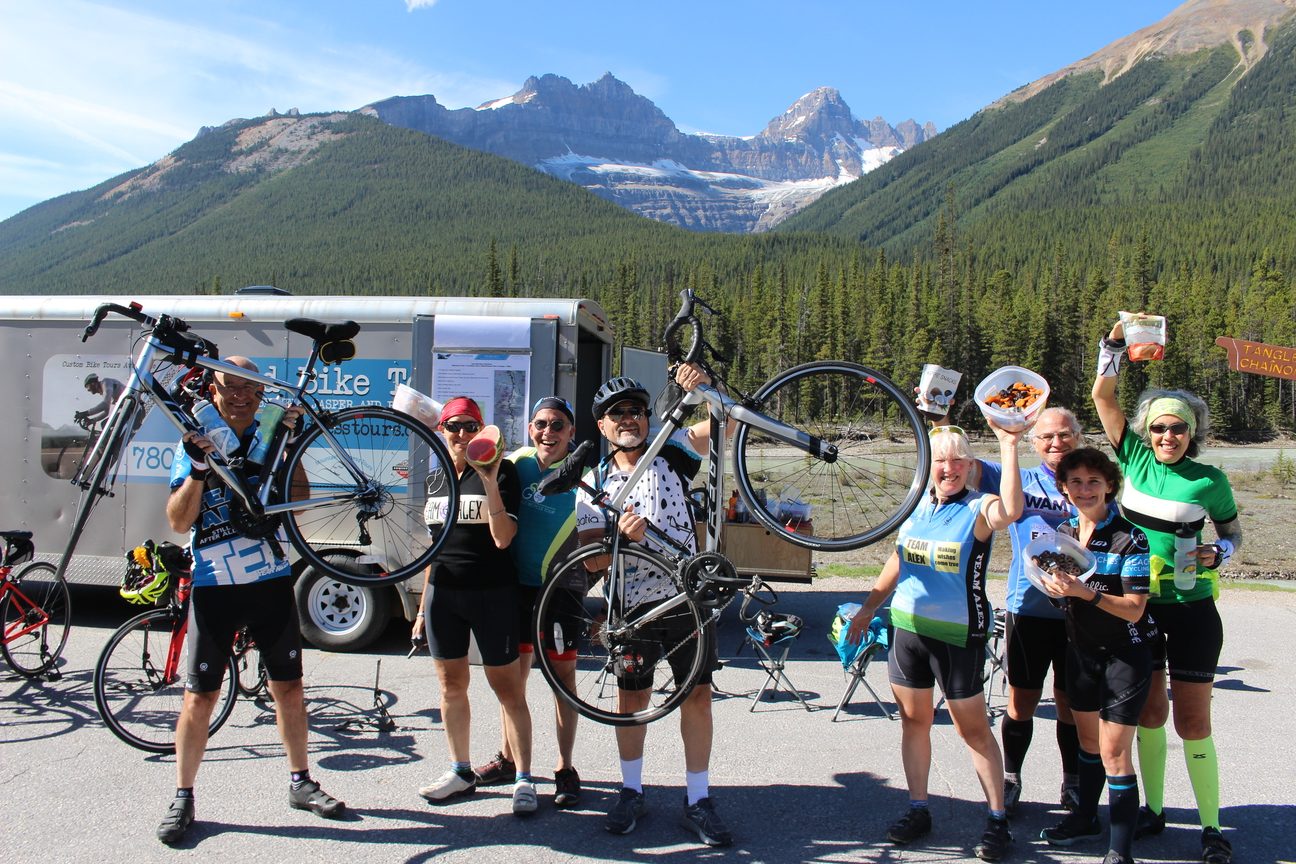 Riders cheering at a rest stop on day two