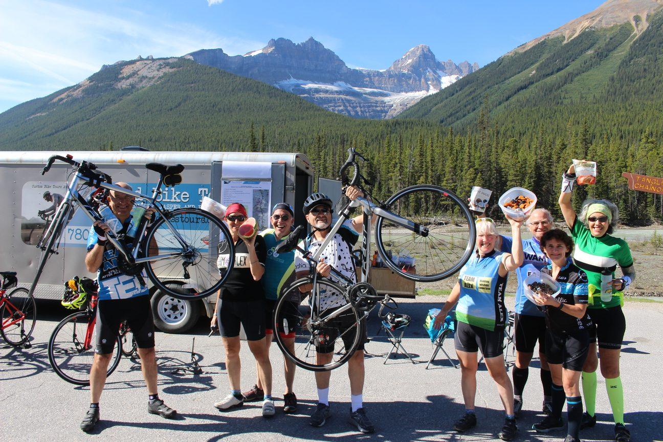 Riders cheering at a rest stop on day two