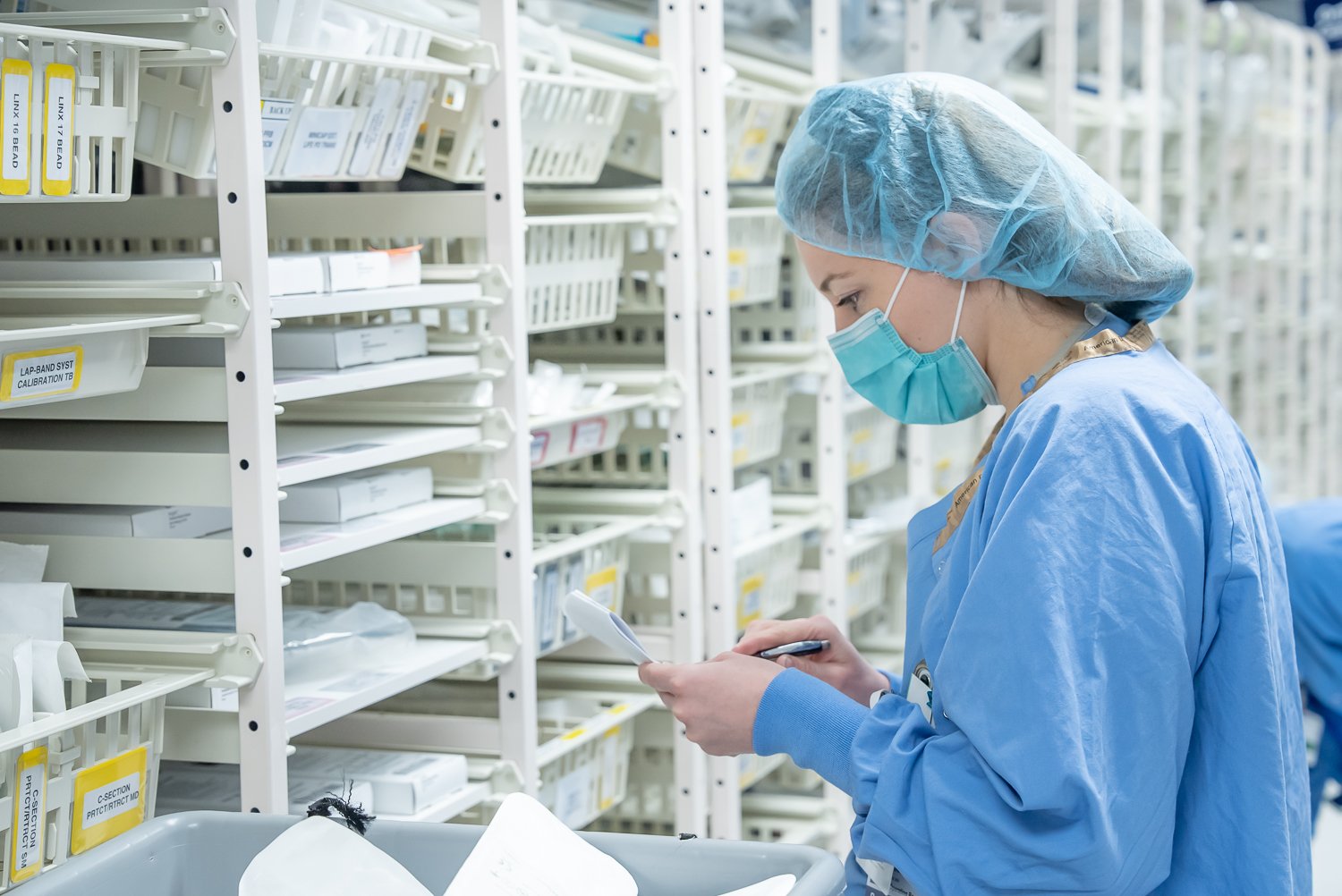 Nurse scanning supplies in a UNICAS high-density storage system