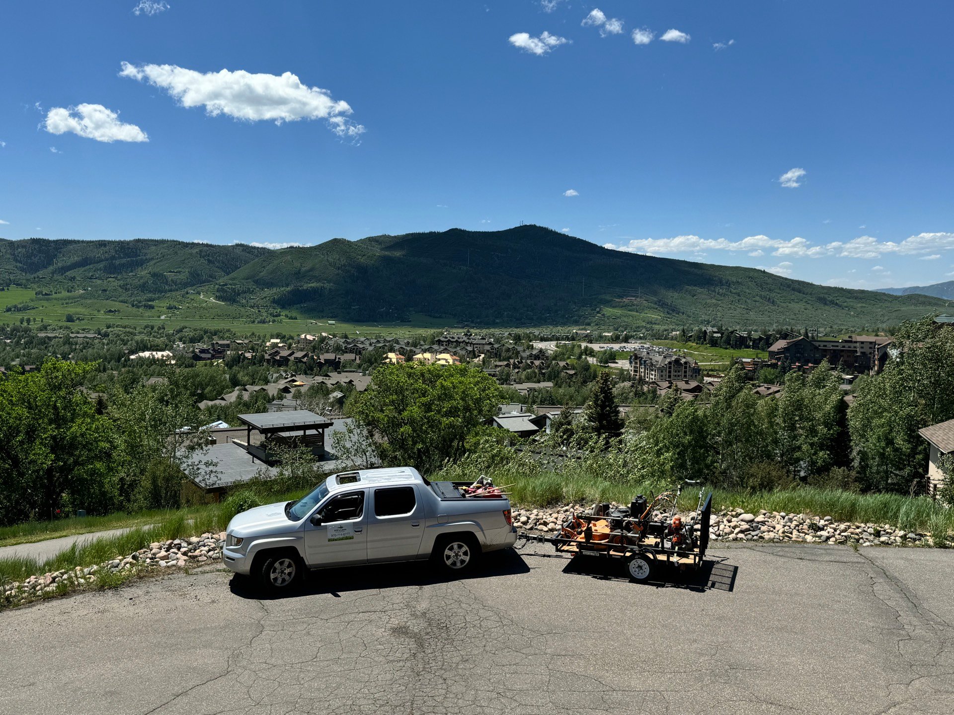 A freshly mowed lawn in Steamboat Springs, Colorado, representative of the property care delivered by Hill's Lawn & Landscape